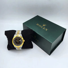 Men's Two-Tone Watch | Black Dial Diamond Markers | Gold Bezel & Cyclops Date | Stainless Steel Chain Pakistan