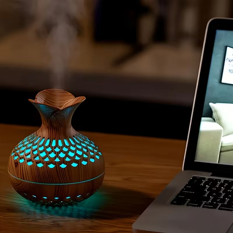 A Dual-spray Mode USB-powered Humidifier Featuring a Wooden Exterior Design with an Elegant and Sophisticated Style That Creates a Rich Ambiance. Its Dual-spray Modes Cater to Various Humidification Needs, While the High-quality Mist Effectively